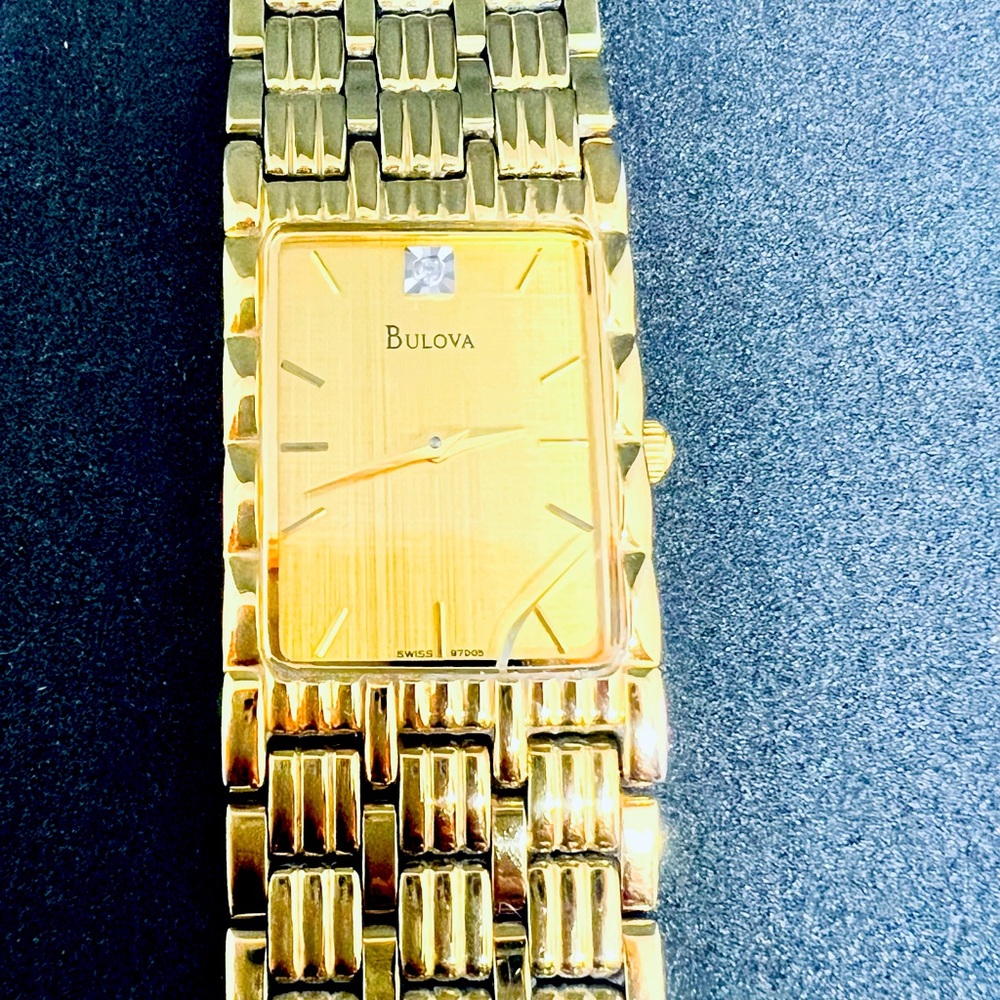Bulova women’s gold watch